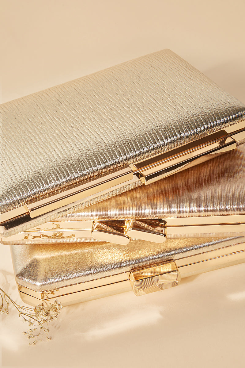 Clutch Manon Gold · Madame ·