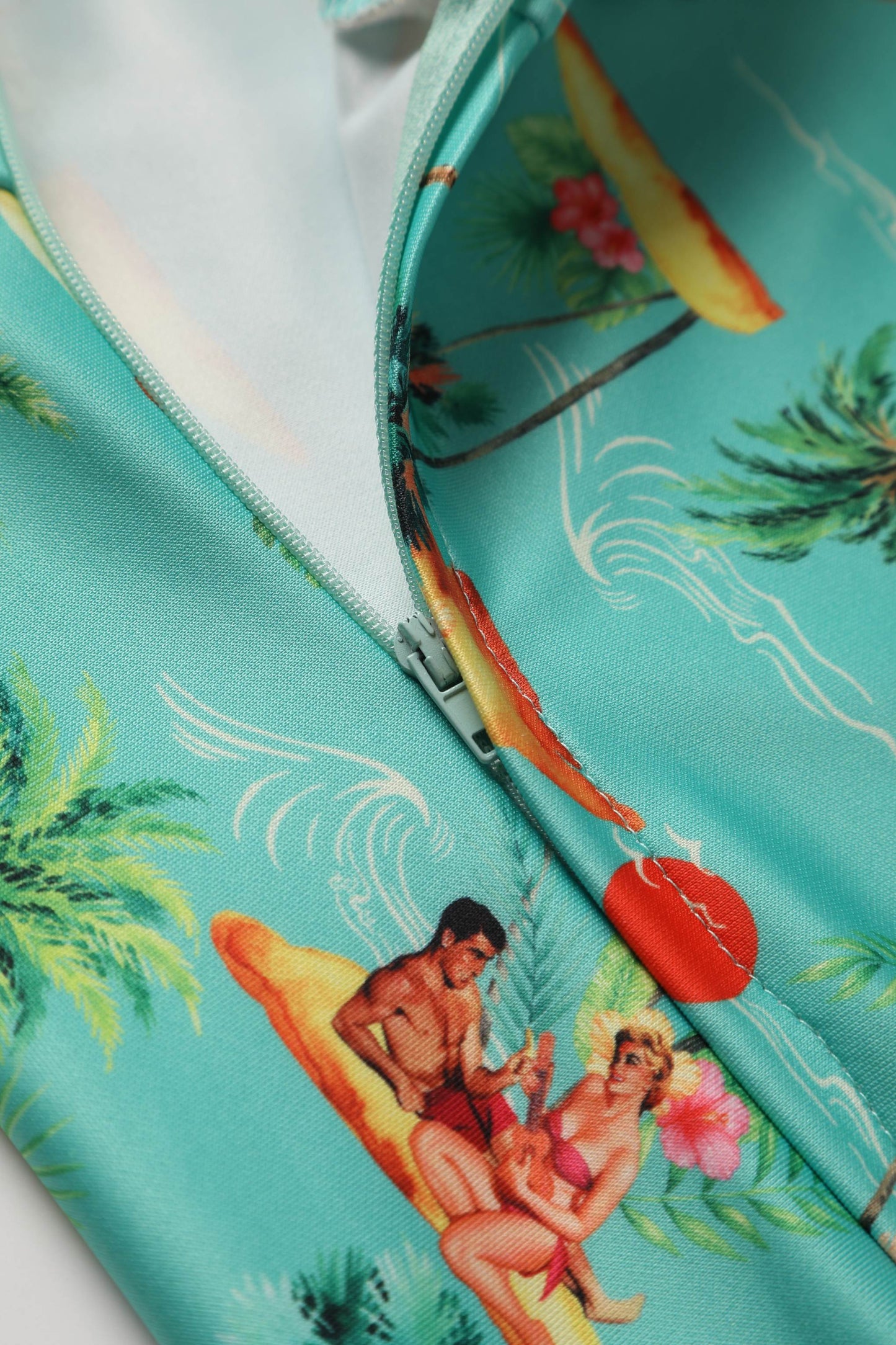 Darlene Turquoise Pinup Swing Dress in Tropical Island Print