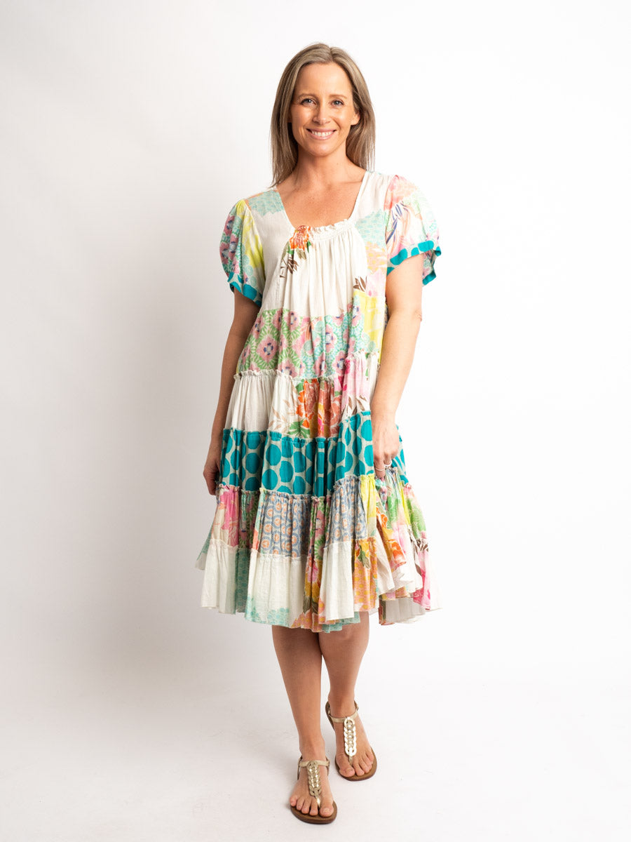 Cap sleeve knee length dress in mixed lime and pink prints