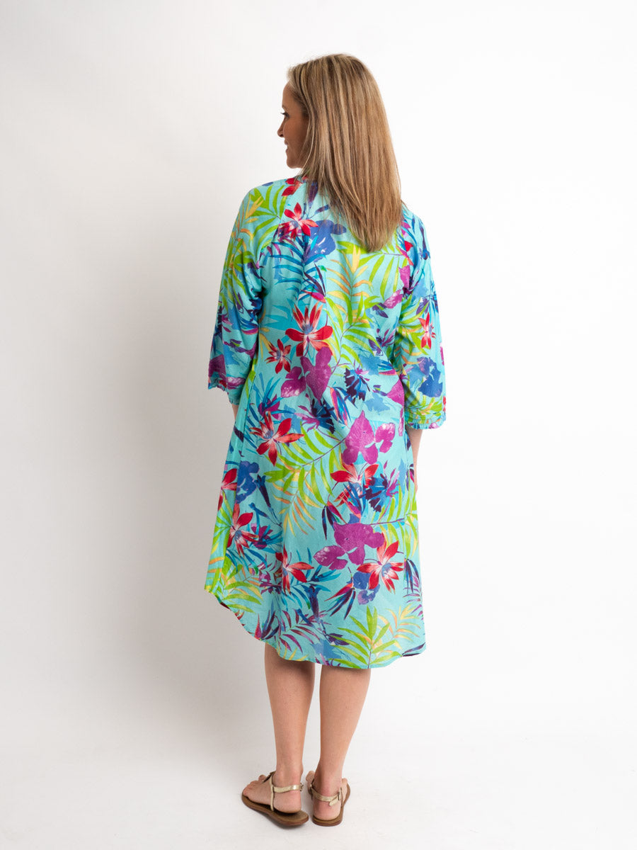 Knee-Length Pleated Dress with Subtle Frills and 3/4 Raglan Sleeve in Turquoise Tropical