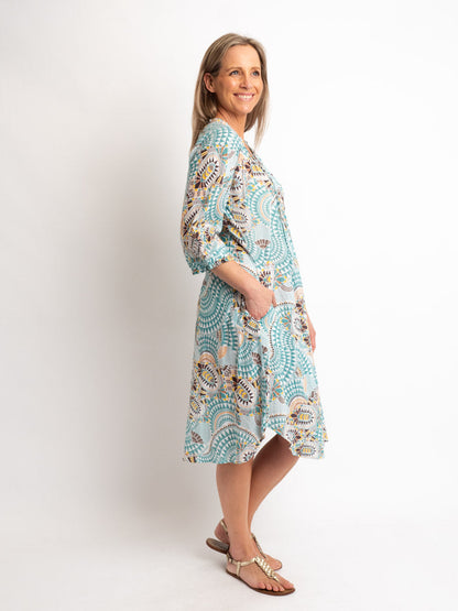 Knee-length Pleated Dress with Subtle Frills and 3/4 Raglan Sleeve in Aqua Geo