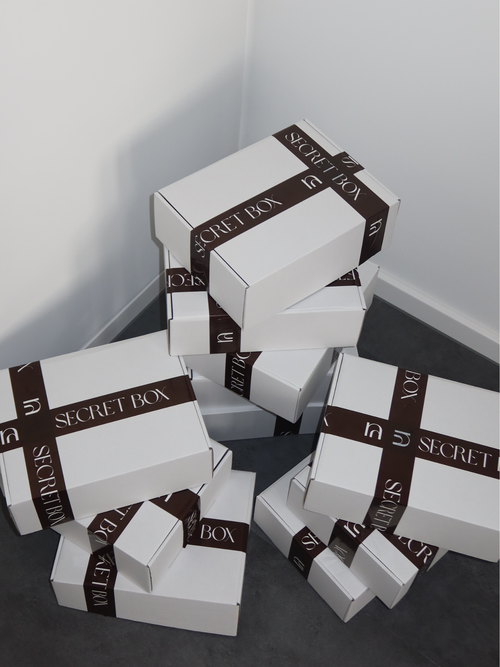 SECRET BOX • Tops
