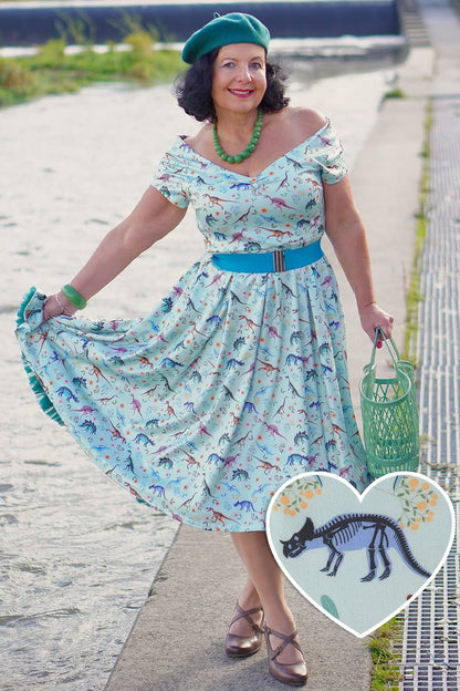 Lily Off Shoulder Midi Dress In Green Dinosaur Fossil Print